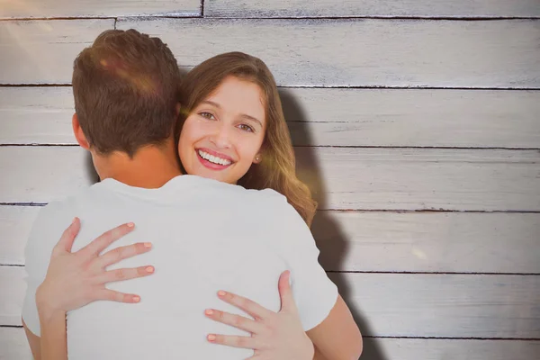 Mujer abrazando hombre — Foto de Stock