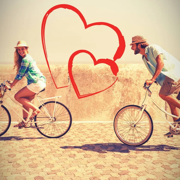 Couple riding bicycles — Stock Photo, Image