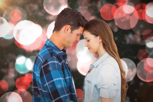 Couple standing head against head — Stock Photo, Image