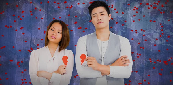 Couple holding broken heart — Stock Photo, Image