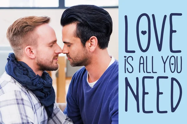 Homosexual couple against blue background — Stock Photo, Image