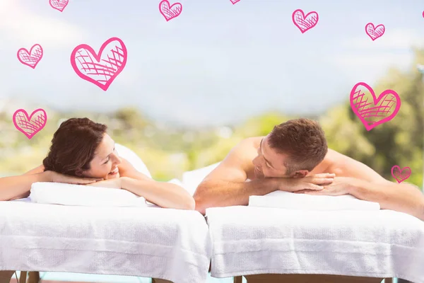 Couple relaxing on massage table — Stock Photo, Image