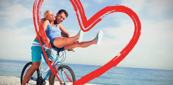 Man giving girlfriend lift on crossbar — Stock Photo, Image