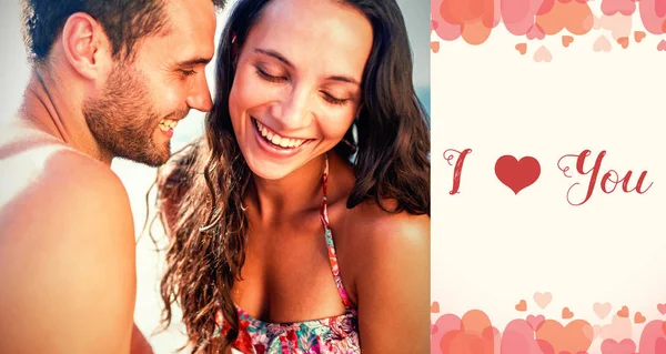 Paar am Strand und Valentines Worte — Stockfoto