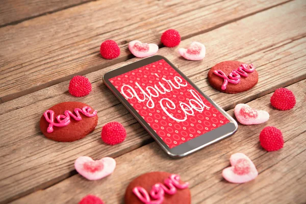 Smartphone y decoración de amor — Foto de Stock