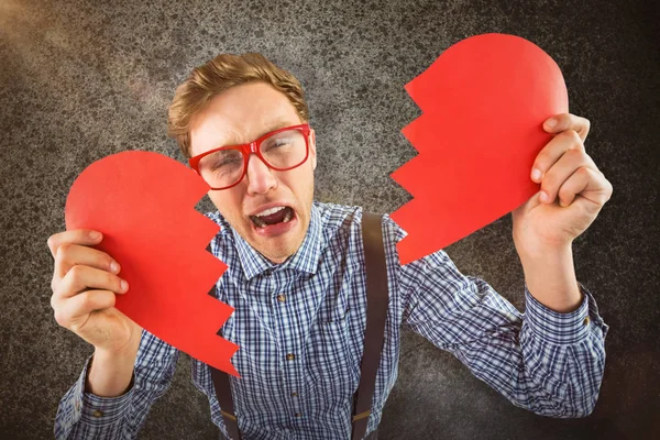 Geeky hipster houden een gebroken hart — Stockfoto