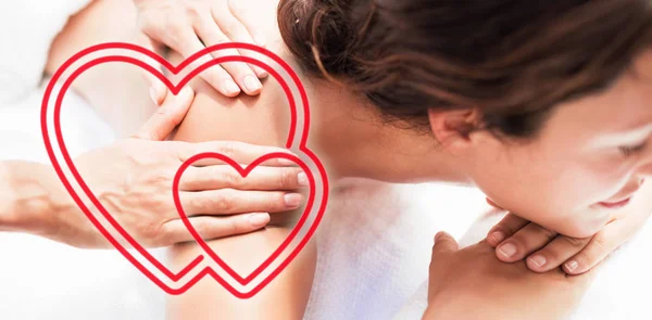 Woman receiving back massage — Stock Photo, Image