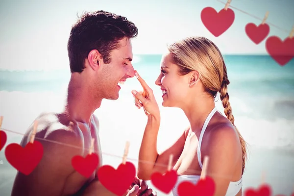 Pareja divirtiéndose en playa —  Fotos de Stock