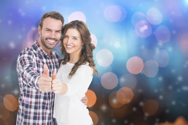 Couple putting thumbs up — Stock Photo, Image