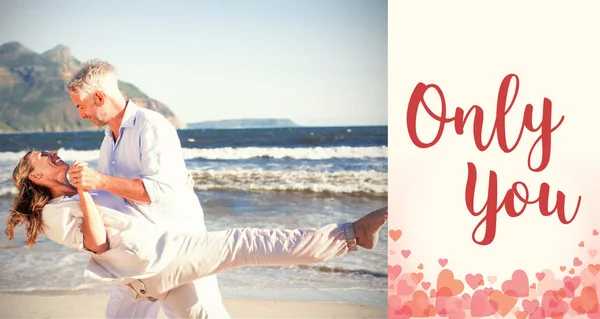 Couple dancing on the beach together — Stock Photo, Image