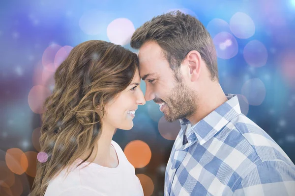 Young couple rubbing nose — Stock Photo, Image