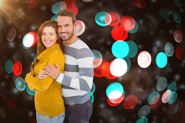 Happy young couple embracing — Stock Photo, Image