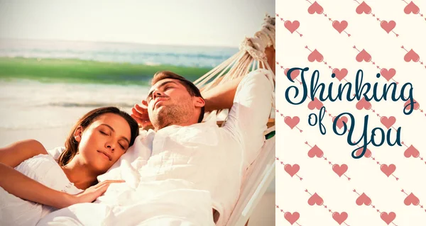 Couple napping in a hammock — Stock Photo, Image