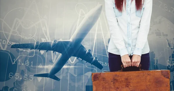 Mid section of woman holding a suitcase — Stock Photo, Image