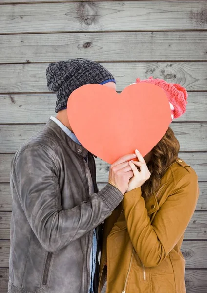 Romantic couple holding heart shape — Stock Photo, Image