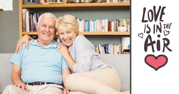 Happy senior couple relaxing in bed — Stock Photo, Image