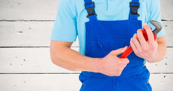 Handy man holding wrench — Stock Photo, Image