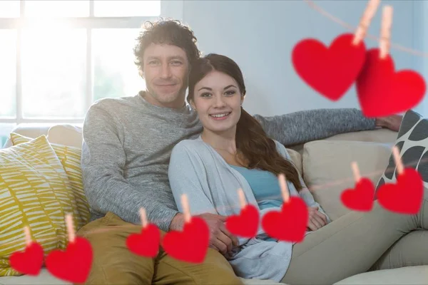 Red heart and happy couple — Stock Photo, Image