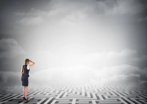 Businesswoman standing on maze — Stock Photo, Image