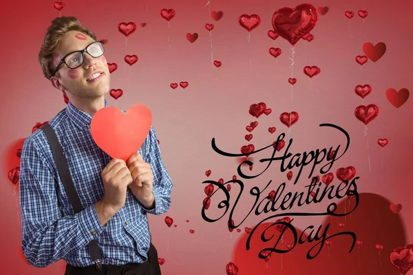 Valentines text and man holding a red heart — Stock Photo, Image