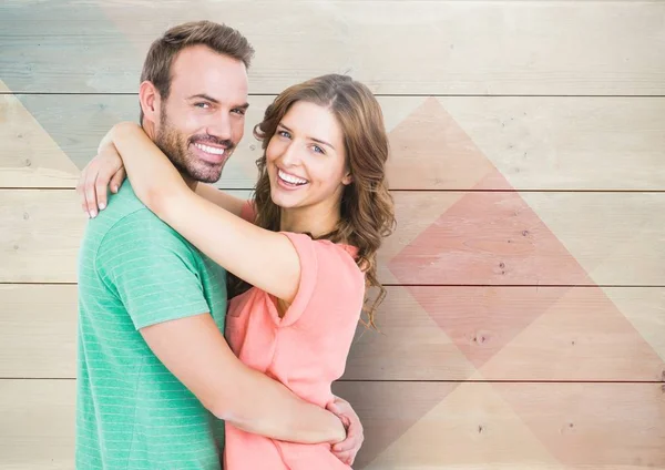 Sonriente pareja abrazándose entre sí — Foto de Stock