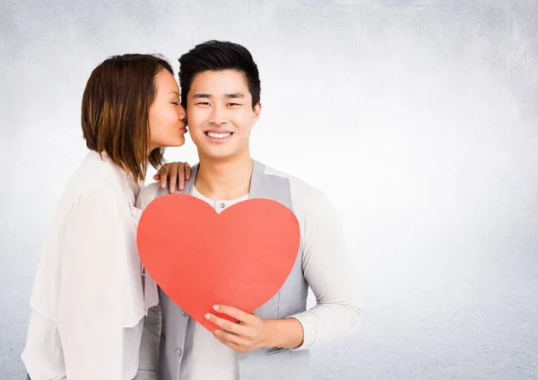 Romantic couple holding heart shape — Stock Photo, Image