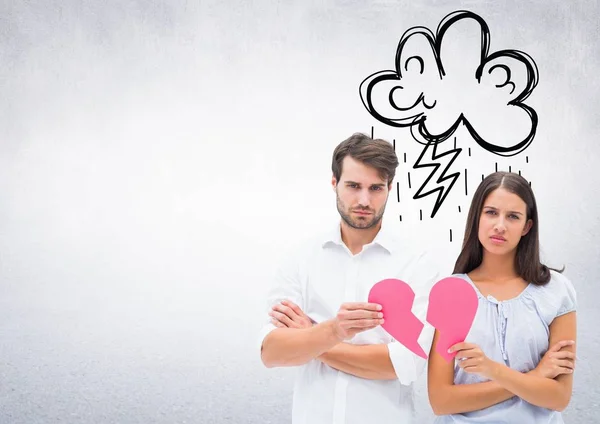 Depressed couple holding broken heart — Stock Photo, Image