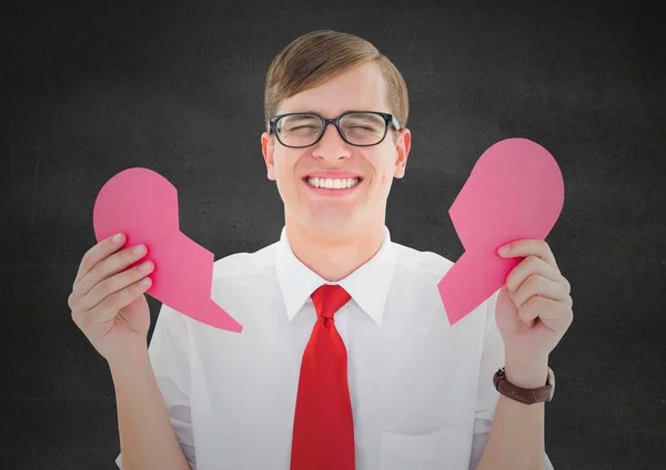 Llorando hombre sosteniendo corazón roto — Foto de Stock