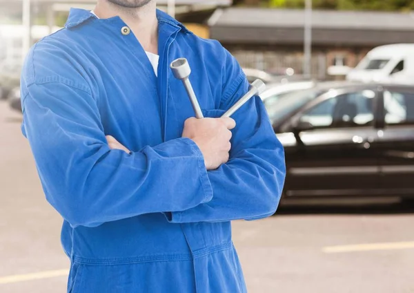 Mechanic holding tool — Stock Photo, Image