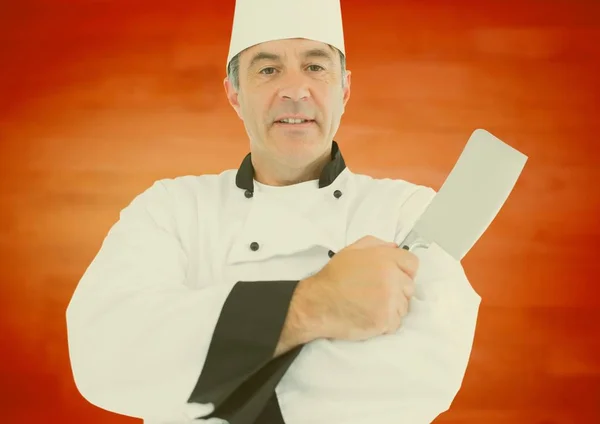 Chef masculino segurando faca de corte — Fotografia de Stock