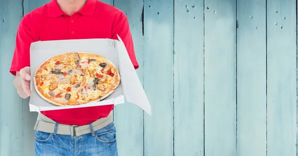 Delivery man holding pizza box — Stock Photo, Image