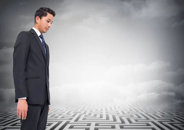 Businessman looking at a maze — Stock Photo, Image