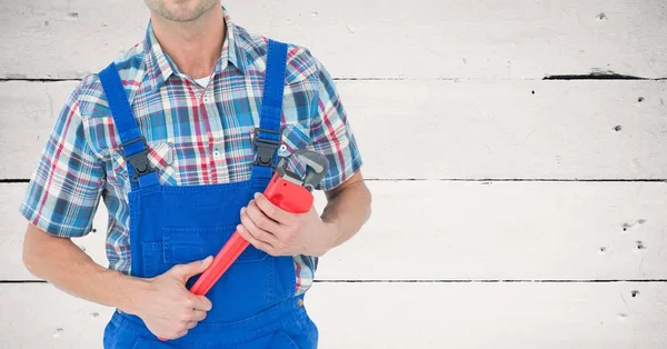 Handy man holding İngiliz anahtarı — Stok fotoğraf