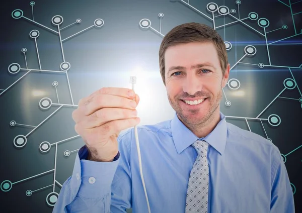 Portrait of businessman holding cable — Stock Photo, Image