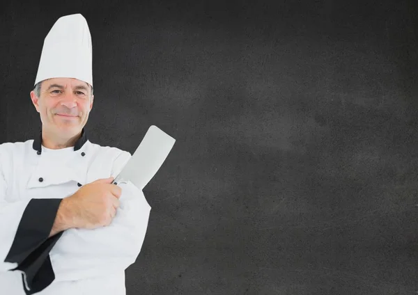 Lachende chef-kok met een mes — Stockfoto
