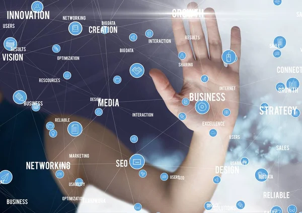 Businessman touching digitally icons — Stock Photo, Image