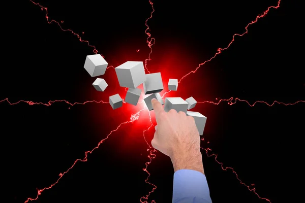Composite image of businessman hand pointing at digitally cubes — Stock Photo, Image