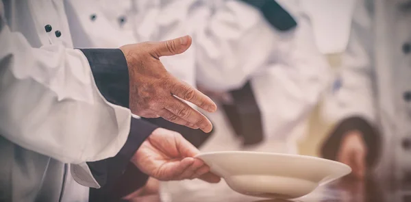 Chef showing class bowl — Stock Photo, Image