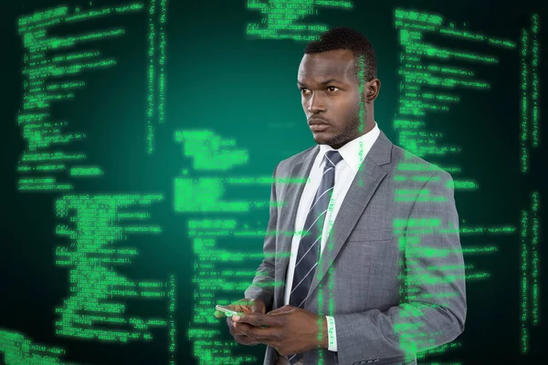 Composite image of businessman holding mobile phone — Stock Photo, Image