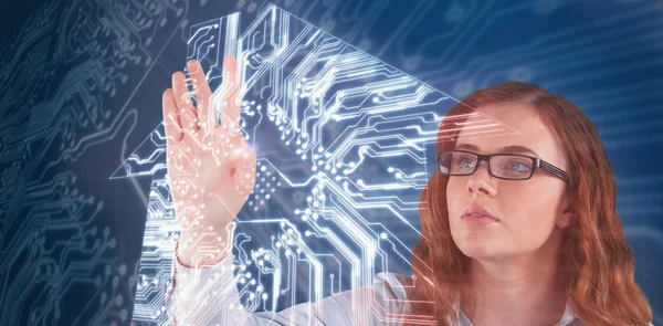 Composite image of woman touching invisible screen — Stock Photo, Image