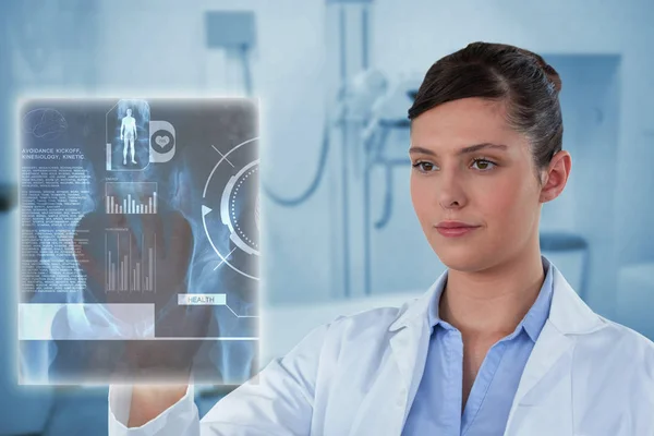 Female doctor using imaginative screen — Stock Photo, Image