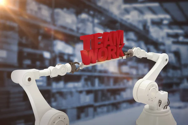 Sammansatt bild av metalliska robotic handen håller team arbete text över vit bakgrund — Stockfoto