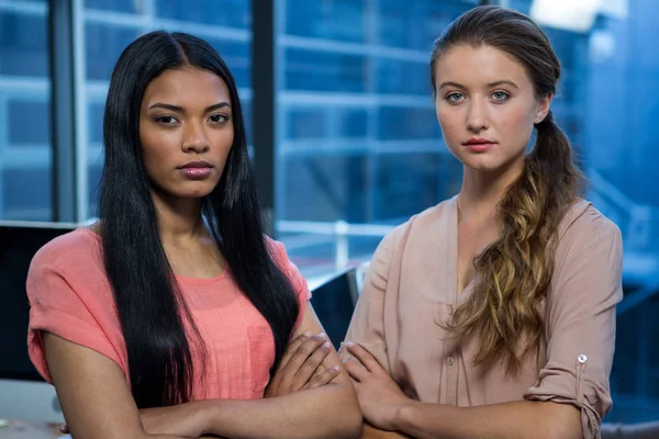 Confident business executives standing in office — Stock Photo, Image