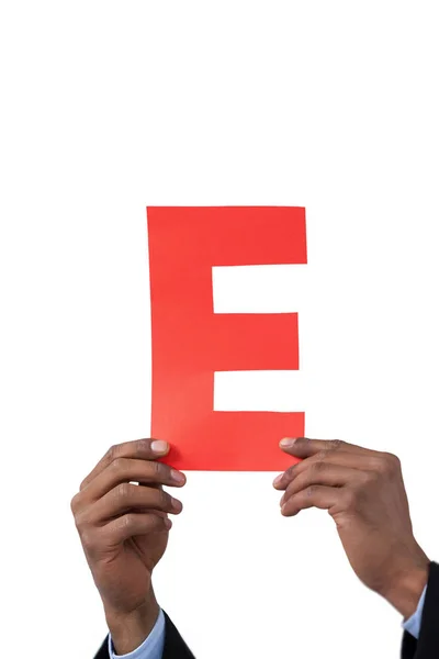 Zakenman die houdt een alfabet e — Stockfoto