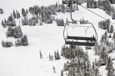 Empty ski lift in the ski resort clipart