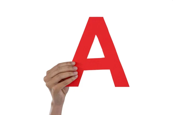 Businesswoman holding an alphabet A — Stock Photo, Image