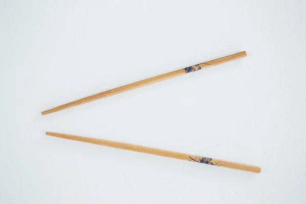 Chopsticks on white background — Stock Photo, Image