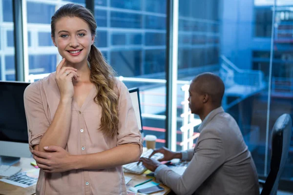 Confident business executive standing in office — Stock Photo, Image