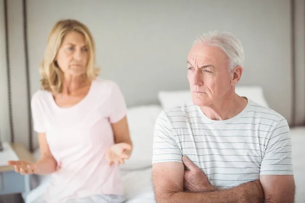 Worried senior man sitting on bed — Stock Photo, Image