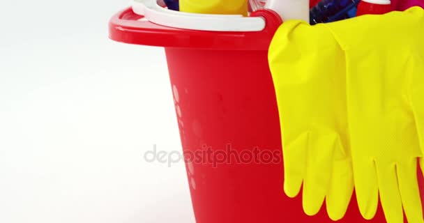 Various housekeeping supplies in a bucket — Stock Video